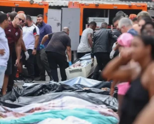 Moradores do Rio retiram quase 60 corpos em área de mata após operação