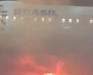Passageiros são retirados de avião após um princípio de incêndio no Aeroporto Internacional de Guarulhos