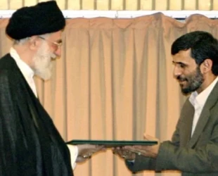 AhmadinejadKhameneiReuters-e1772386596591.jpg