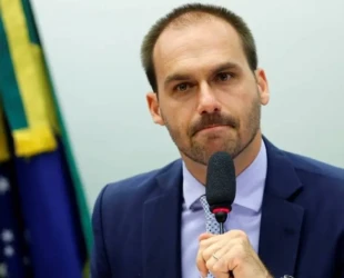 x84190059_Brazilian-Federal-Deputy-Eduardo-Bolsonaro-attends-a-session-of-the-Committee-on-Foreig.jpg.pagespeed.ic.5ptF1RgHpf