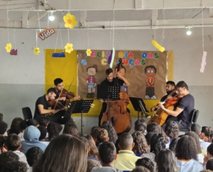 Escolas de Goiânia e Aparecida recebem orquestra com música clássica na semana do Dia das Crianças
